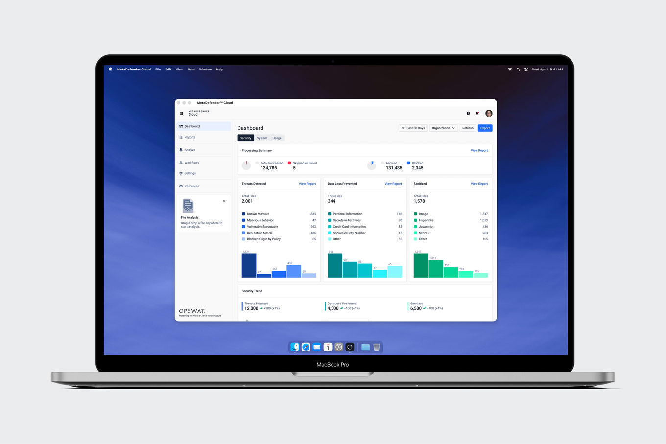 MetaDefender Cloud on a laptop — the dashboard with threats detected, data loss prevented and files sanitized side by side