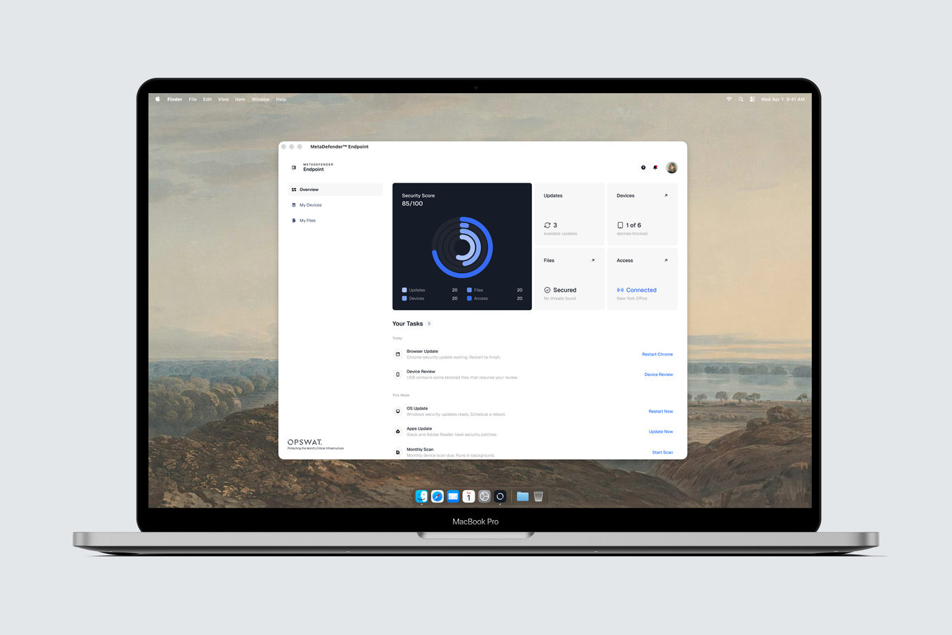 MetaDefender Endpoint on a MacBook — security score, updates, devices, files and access, with a plain-language task list